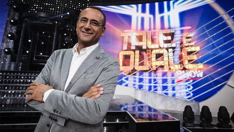 Guida Tv 14 settembre: Canale 5 sfida Carlo Conti con Checco Zalone
